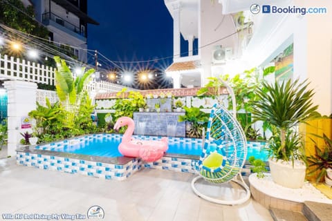 Patio, Night, Natural landscape, Living room, Seating area, Pool view, Swimming pool, sunbed