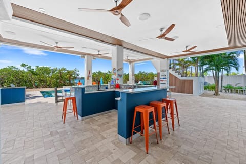 Luxury Seaside Escape ~ Heated Pool w Jacuzzi ~ Elevator ~ Dock ~ Scenic Views Maison in Key Colony Beach