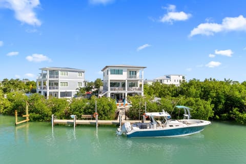 Luxury Seaside Escape ~ Heated Pool w Jacuzzi ~ Elevator ~ Dock ~ Scenic Views Casa in Key Colony Beach