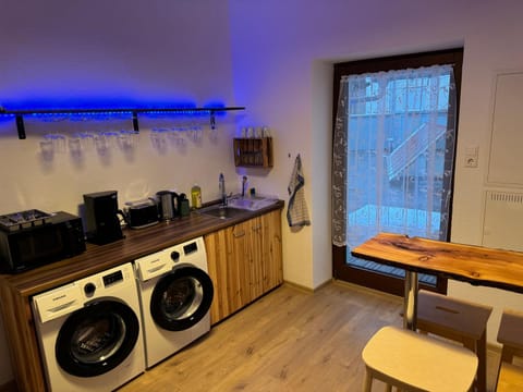 Lounge or bar, washing machine, kitchen