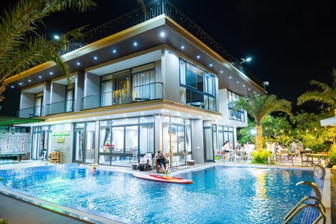 Property building, Night, Swimming pool