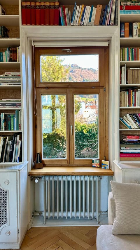 Library, Living room, Seating area, Garden view