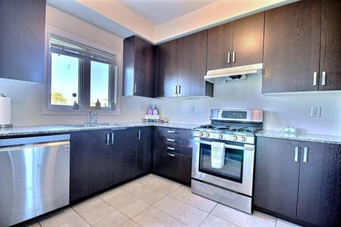 Kitchen or kitchenette, oven, stove