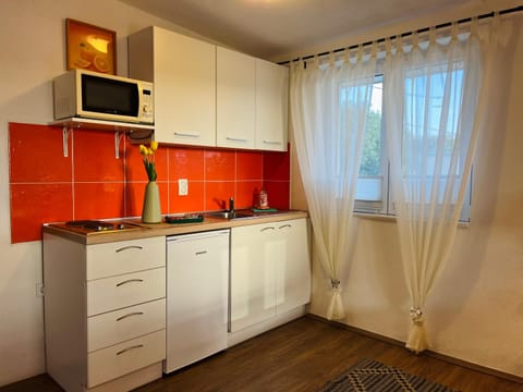 Kitchen or kitchenette, stove