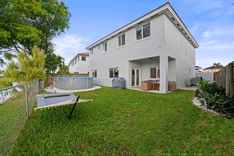 Property building, Patio, Day, Pool view, Swimming pool