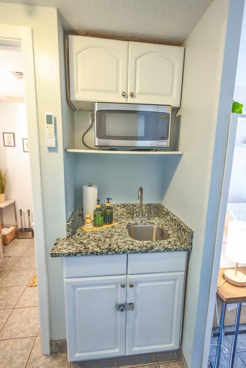 Kitchen or kitchenette, microwave