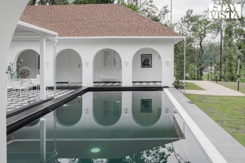 Mudra Manor- River View Villa with Comp Breakfast, Heated Pool and Jacuzzi by StayVista Villa in Kerala