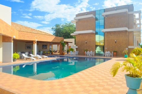 Property building, Patio, Day, Pool view, Swimming pool, sunbed