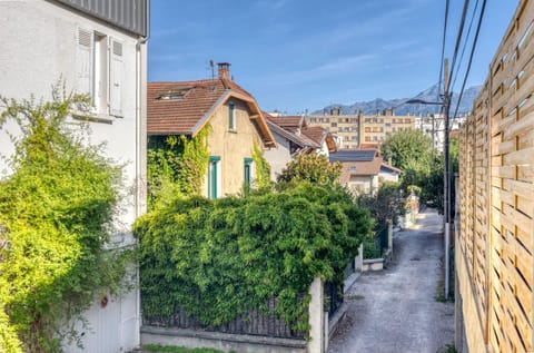 Property building, Spring, Day, Neighbourhood, Natural landscape, City view, Mountain view, Street view