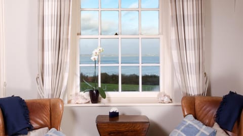 Living room, Seating area, Beach, Landmark view, Sea view