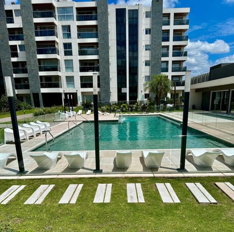 Property building, Day, Pool view, Swimming pool, sunbed