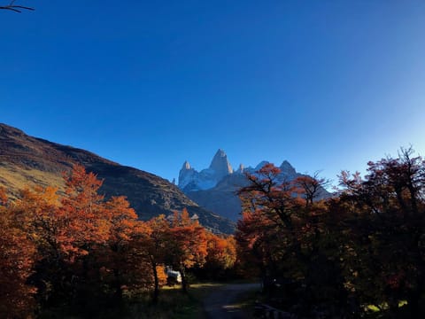 Property building, Nearby landmark, Natural landscape, Mountain view