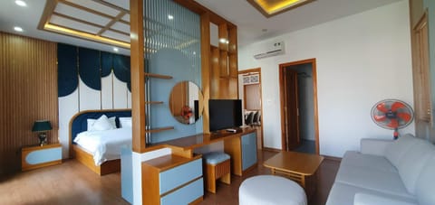 Bed, TV and multimedia, Living room, Seating area, Bedroom, air conditioner