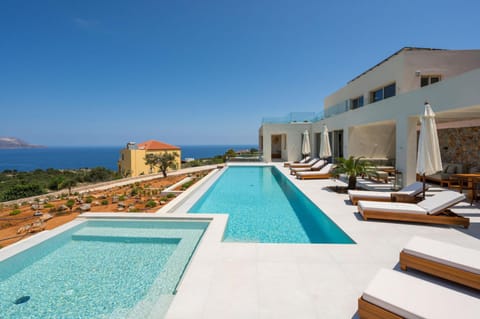 Property building, Day, Natural landscape, Pool view, Sea view, Swimming pool, sunbed