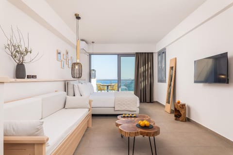 Bed, TV and multimedia, Seating area, Sea view