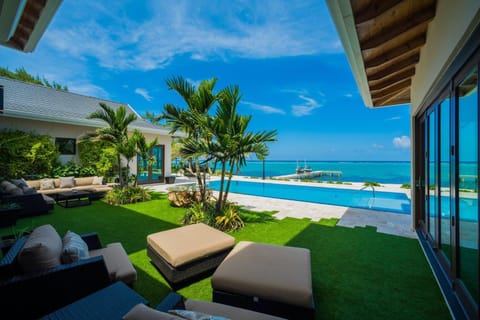 Patio, Day, Natural landscape, Garden, Living room, Seating area, Garden view, Pool view, Sea view, Swimming pool, sunbed