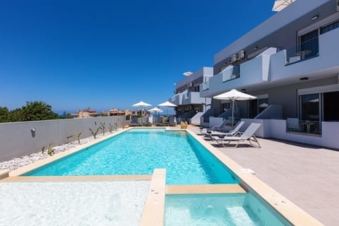 Property building, Patio, Day, View (from property/room), Pool view, Sea view, Swimming pool, sunbed