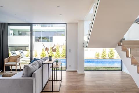 Living room, Seating area, Pool view