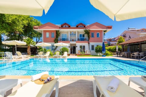 Property building, Swimming pool, Swimming pool, sunbed