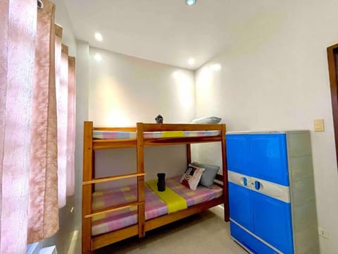 Cozy Flat-Fully Furnished Filipino Minimalist Inspired Unit with 40" Andriod TV Near Airport Condo in Puerto Princesa