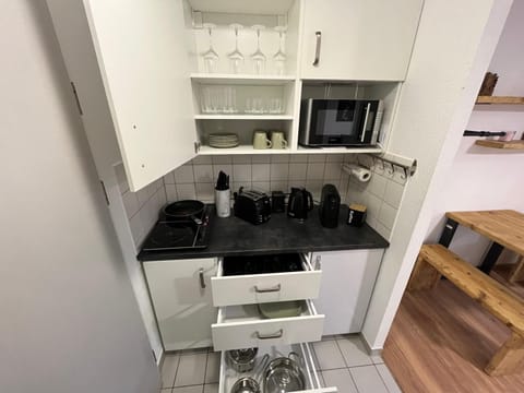 Kitchen or kitchenette, stove, toaster