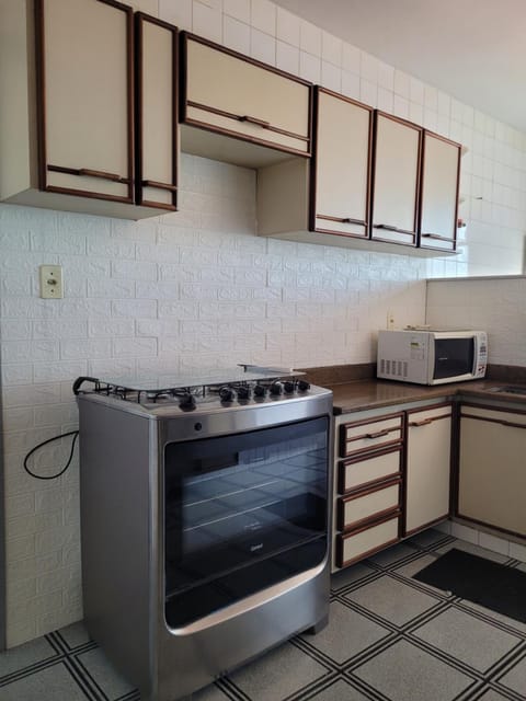 Kitchen or kitchenette, oven, stove