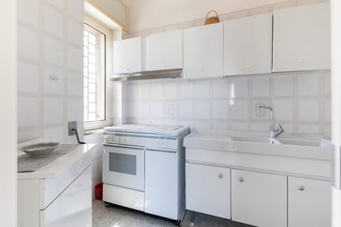 Kitchen or kitchenette, stove