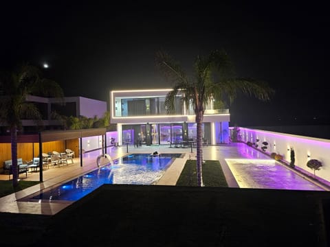 Property building, Night, Pool view, Swimming pool, sunbed