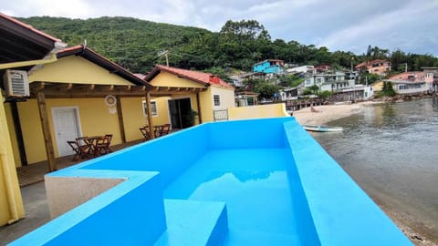 Casa pé na areia com vista especial do pôr do sol. House in Florianopolis