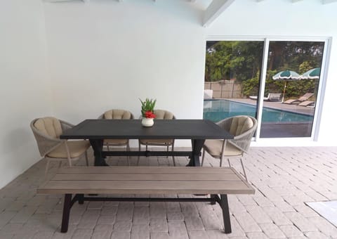 Patio, Dining area, Pool view