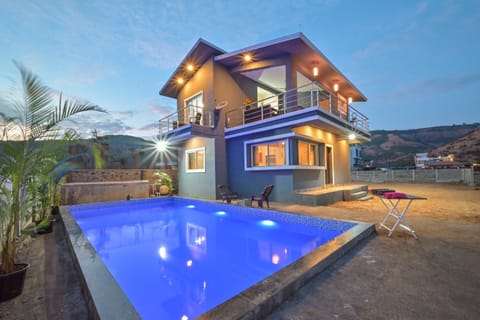 Property building, Patio, Day, Night, Natural landscape, Mountain view, Pool view, Swimming pool, sunbed