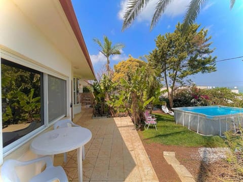 Property building, Garden, Pool view, Swimming pool