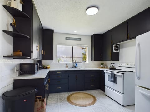 Kitchen or kitchenette, microwave, stove, kitchen