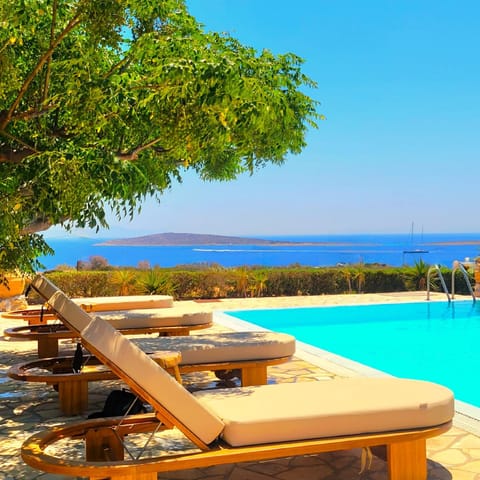 Property building, Day, Natural landscape, Pool view, Sea view, Swimming pool, sunbed