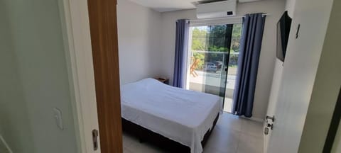 Quartos Confortáveis em casa compartilhada - 5 min Aeroporto Internacional Apartment in Florianopolis