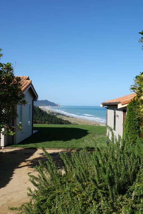 Property building, Day, Natural landscape, Beach, Sea view