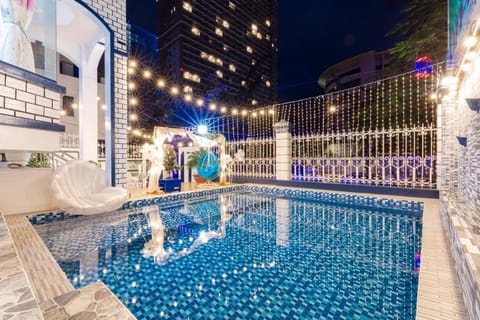 Property building, Night, Pool view, Swimming pool, sunbed