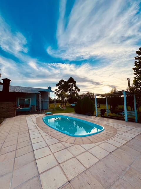 Property building, Day, Natural landscape, Pool view, Swimming pool