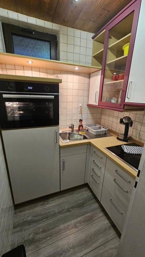 Kitchen or kitchenette, oven, stove