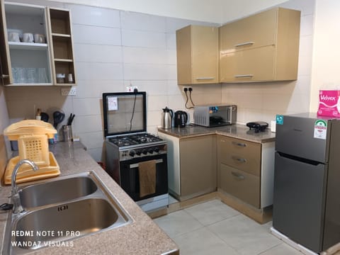 Kitchen or kitchenette, stove