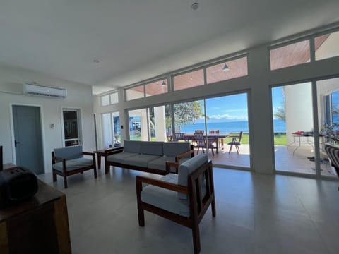 Patio, Living room, Seating area, Dining area, Sea view