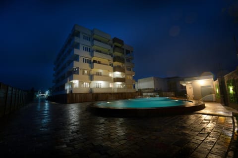 Property building, Night, Natural landscape, Pool view, Swimming pool