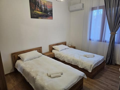 Bed, Photo of the whole room, Bedroom, towels, air conditioner