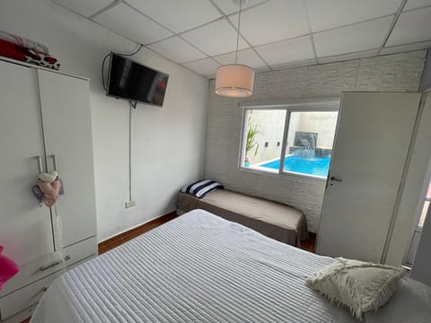 Bed, TV and multimedia, Photo of the whole room, Bedroom, Pool view, Swimming pool