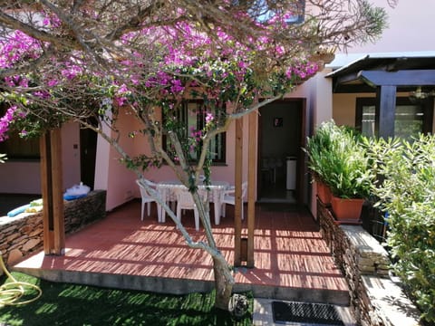 Property building, Patio, Dining area, Garden view