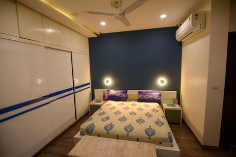 Bed, wardrobe, air conditioner