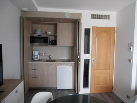 Kitchen or kitchenette, stove