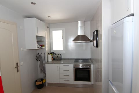 Kitchen or kitchenette, dishwasher, furniture, pet friendly, stove, toaster, washing machine