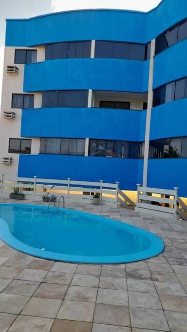 Apartamento azul no condomínio Mar de Cotovelo Apartment in Parnamirim