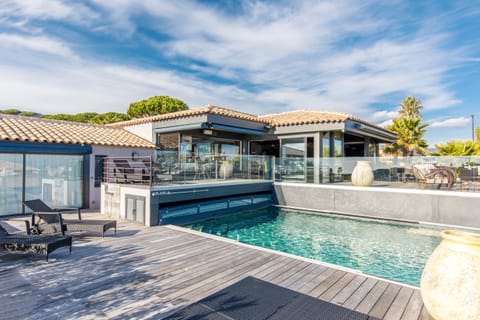 Property building, Patio, Swimming pool, sunbed